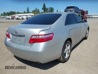 2009 Toyota Camry z VIN 4T1BE46K99U274082, wystawiony jako IAAI lot #42419700 z przebiegiem 124 552 mil mil oraz . Historia ofert i sprzedaży dostępna na DreamBid. Obrazek 4.