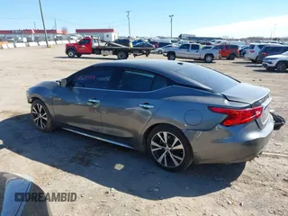 2018 Nissan Maxima SV with VIN 1N4AA6AP4JC388887, listed as a IAAI auction lot 41688858 with 63,678 mi miles and . Bid and sale history available at DreamBid. Image 14.