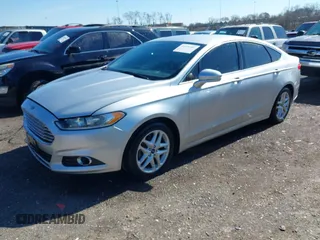 2014 Ford Fusion SE with VIN 3FA6P0HR0ER104588, listed as a IAAI auction lot 41573701 with 281,160 mi miles. Bid and sale history available at carsss.com. Image 2.