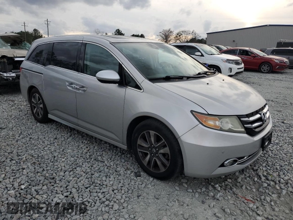 2014 Honda Odyssey Touring with VIN 5FNRL5H90EB096137, listed as a Copart auction lot 47192275 with 164,620 mi miles and Salvage Title. Bid and sale history available at DreamBid. Image 4.