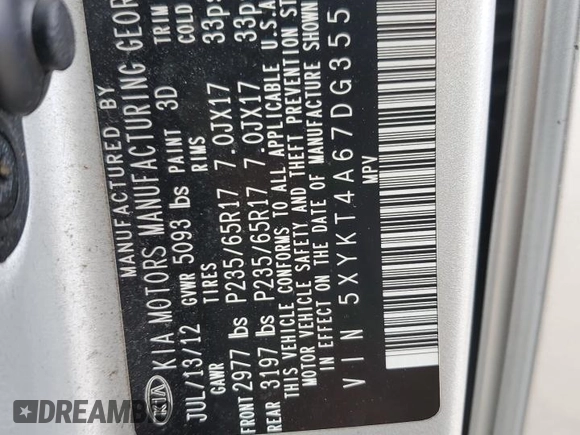 2013 Kia Sorento LX z VIN 5XYKT4A67DG355452, wystawiony jako Copart lot #54902255 z przebiegiem 188 949 mil mil oraz Szkoda całkowita • Salvage title. Historia ofert i sprzedaży dostępna na DreamBid. Obrazek 14.