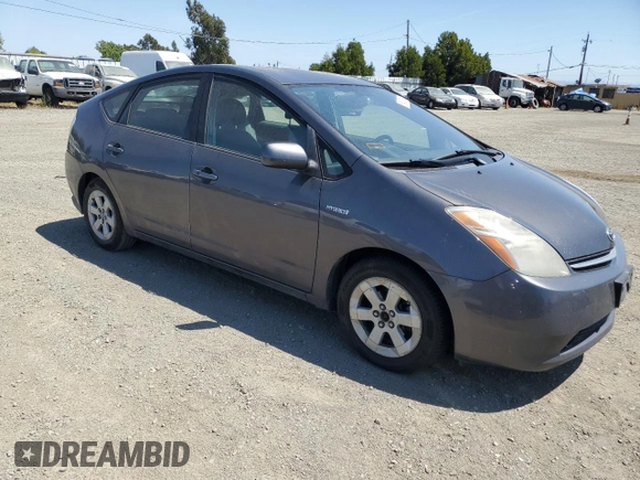 2007 Toyota Prius z VIN JTDKB20U473211597, wystawiony jako Copart lot #58437915 z przebiegiem 252 737 mil mil oraz Szkoda całkowita • Salvage title. Historia ofert i sprzedaży dostępna na DreamBid. Obrazek 4.
