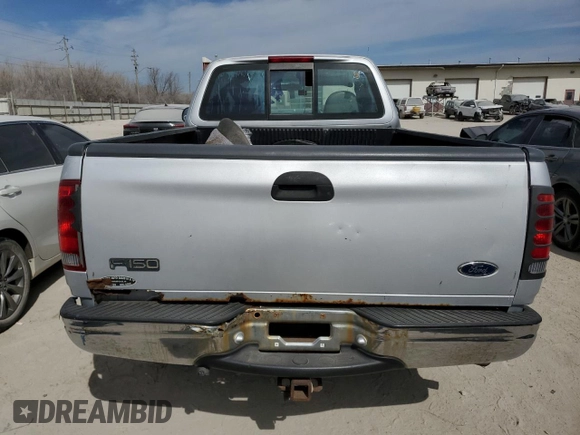 1998 Ford F-150 z VIN 1FTZF18W9WKA65043, wystawiony jako Copart lot #48902695 z przebiegiem 133 727 mil mil oraz Szkoda całkowita • Salvage title. Historia ofert i sprzedaży dostępna na DreamBid. Obrazek 6.