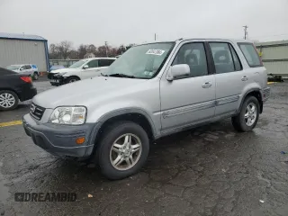 1999 Honda CR-V EX with VIN JHLRD1864XC001402, listed as a Copart auction lot 82047384 with 195,489 mi miles and Clean Title. Bid and sale history available at carsss.com. Image 1.