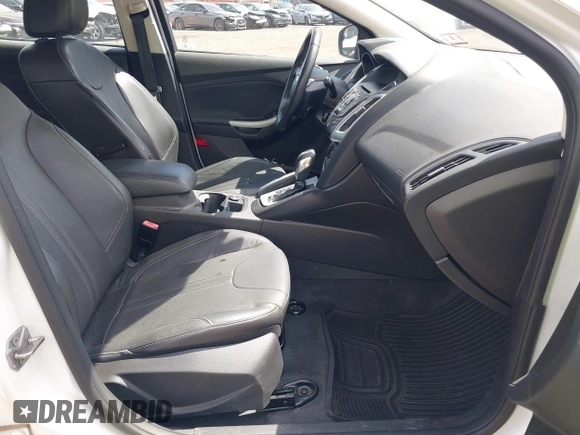 2013 Ford Focus SE with VIN 1FADP3K29DL182434, listed as a IAAI auction lot 42138008 with 103,072 mi miles. Bid and sale history available at carsss.com. Image 5.