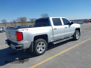 2014 Chevrolet Silverado 1500 LTZ with VIN 3GCUKSEC8EG355088, listed as a IAAI auction lot 41979592 with 209,733 mi miles and . Bid and sale history available at DreamBid. Image 4.
