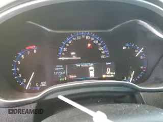 2015 Cadillac SRX Performance Collection with VIN 3GYFNFE39FS556708, listed as a Copart auction lot 41670355 with 177,601 mi miles and Salvage title. Bid and sale history available at DreamBid. Image 9.