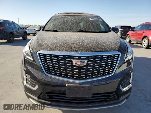 2021 Cadillac XT5 FWD Premium Luxury with VIN 1GYKNCRS5MZ138712, listed as a Copart auction lot 49697945 with 54,893 mi miles and Salvage Title. Bid and sale history available at carsss.com. Image 5.