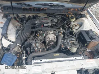 1997 Ford Thunderbird LX with VIN 1FALP62W6VH142784, listed as a IAAI auction lot 41792883 with 244,300 mi miles. Bid and sale history available at carsss.com. Image 10.