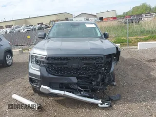 2024 Ford Ranger XLT z VIN 1FTER4HH6RLE34724, wystawiony jako IAAI lot #42256858 z przebiegiem 12 438 mil mil oraz . Historia ofert i sprzedaży dostępna na DreamBid. Obrazek 13.