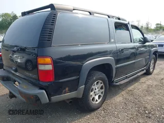 2003 Chevrolet Suburban Z71 with VIN 3GNFK16T23G325753, listed as a IAAI auction lot 42409253 with 247,494 mi miles and . Bid and sale history available at DreamBid. Image 4.