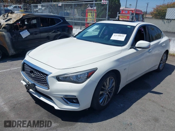 2019 Infiniti Q50 Luxe z VIN JN1EV7AP7KM518276, wystawiony jako IAAI lot #42148033 z przebiegiem 56 720 mil mil oraz . Historia ofert i sprzedaży dostępna na DreamBid. Obrazek 2.