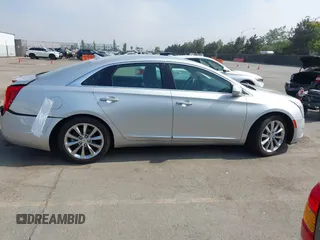 2014 Cadillac XTS Luxury with VIN 2G61N5S30E9294994, listed as a IAAI auction lot 42617654 with 159,573 mi miles and . Bid and sale history available at DreamBid. Image 14.