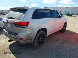 2017 Jeep Grand Cherokee Laredo with VIN 1C4RJFAG9HC824883, listed as a IAAI auction lot 41876117 with 141,067 mi miles. Bid and sale history available at carsss.com. Image 4.