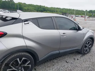 2018 Toyota C-HR XLE with VIN NMTKHMBXXJR031420, listed as a IAAI auction lot 42225490 with 80,628 mi miles and . Bid and sale history available at DreamBid. Image 13.