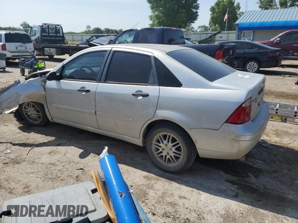 2005 Ford Focus S with VIN 1FAFP34N95W247489, listed as a Copart auction lot 60858415 with Not provided miles and Salvage title. Bid and sale history available at DreamBid. Image 2.