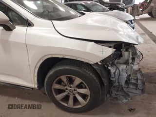 2018 Lexus RX 350 z VIN 2T2BZMCA5JC144530, wystawiony jako IAAI lot #41417396 z przebiegiem 97 860 mil mil oraz . Historia ofert i sprzedaży dostępna na DreamBid. Obrazek 19.