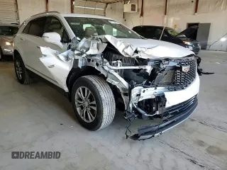 2020 Cadillac XT5 Premium Luxury FWD with VIN 1GYKNCRS9LZ235779, listed as a Copart auction lot 47775965 with 59,501 mi miles and Salvage Title. Bid and sale history available at carsss.com. Image 12.
