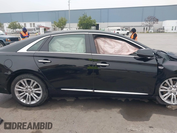2018 Cadillac XTS Luxury with VIN 2G61M5S33J9119684, listed as a IAAI auction lot 41659807 with 107,156 mi miles and . Bid and sale history available at DreamBid. Image 12.