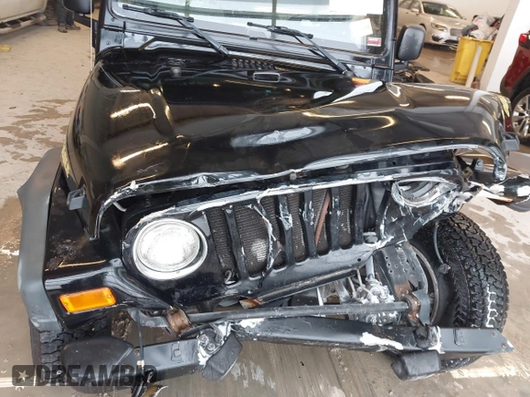 2006 Jeep Wrangler Sport with VIN 1J4FA49S96P733712, listed as a IAAI auction lot 41572913 with 93,511 mi miles. Bid and sale history available at carsss.com. Image 18.
