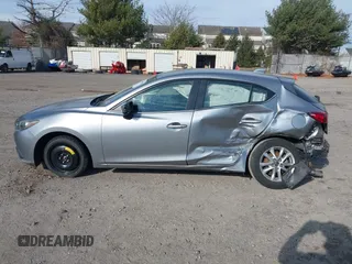 2014 Mazda 3 i Touring z VIN JM1BM1L78E1185248, wystawiony jako IAAI lot #40983056 z przebiegiem 140 911 mil mil oraz . Historia ofert i sprzedaży dostępna na DreamBid. Obrazek 13.
