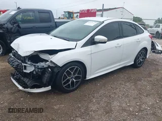 2016 Ford Focus SE with VIN 1FADP3F21GL288553, listed as a IAAI auction lot 42253117 with 107,727 mi miles and . Bid and sale history available at DreamBid. Image 2.