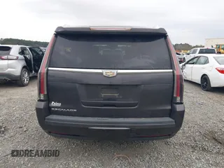 2016 Cadillac Escalade Platinum z VIN 1GYS4DKJ1GR363238, wystawiony jako IAAI lot #40974636 z przebiegiem 128 296 mil mil oraz . Historia ofert i sprzedaży dostępna na DreamBid. Obrazek 16.