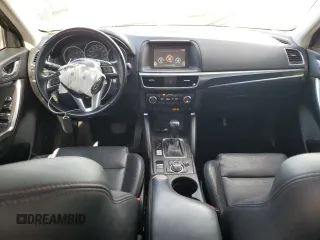 2016 Mazda CX-5 Grand Touring with VIN JM3KE2DY0G0888854, listed as a Copart auction lot 68379754 with 73,096 mi miles and Salvage Title. Bid and sale history available at carsss.com. Image 8.