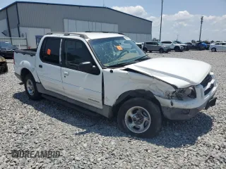 2002 Ford Explorer Sport Trac Value with VIN 1FMZU67E12UB93878, listed as a Copart auction lot 56306785 with 159,476 mi miles and Salvage title. Bid and sale history available at DreamBid. Image 4.