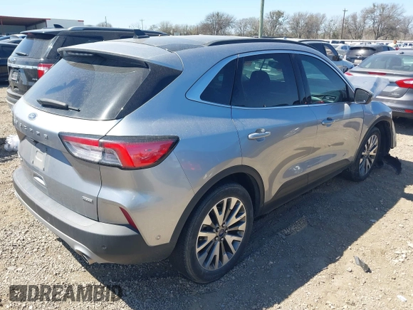 2021 Ford Escape Titanium Hybrid z VIN 1FMCU0DZ3MUB04065, wystawiony jako IAAI lot #41764797 z przebiegiem 28 881 mil mil oraz . Historia ofert i sprzedaży dostępna na DreamBid. Obrazek 4.