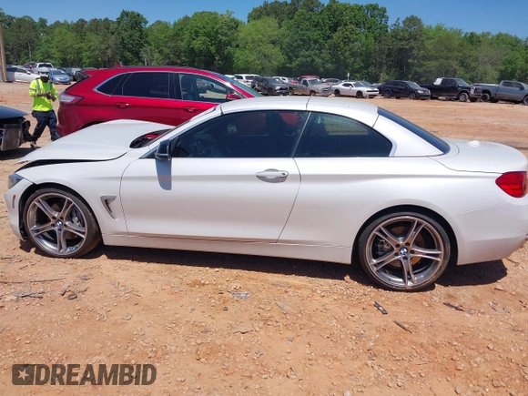 2014 BMW 4 Series 435i z VIN WBA3T3C5XEP737022, wystawiony jako IAAI lot #42135541 z przebiegiem 70 080 mil mil oraz . Historia ofert i sprzedaży dostępna na DreamBid. Obrazek 14.