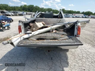1999 Ford Super Duty F-250 XL with VIN 1FTNX20F2XEC42996, listed as a Copart auction lot 63616344 with 0 mi miles and Salvage Title. Bid and sale history available at carsss.com. Image 6.