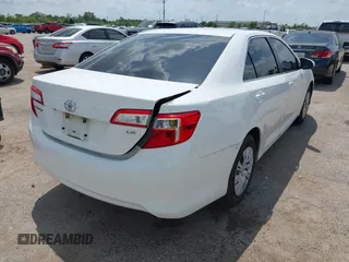 2014 Toyota Camry L with VIN 4T4BF1FK2ER375590, listed as a IAAI auction lot 42101553 with 126,849 mi miles and . Bid and sale history available at DreamBid. Image 4.