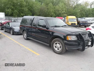 1999 Ford F-150 with VIN 2FTRX17W4XCB10295, listed as a IAAI auction lot 42265387 with 131,923 mi miles and . Bid and sale history available at DreamBid. Image 1.