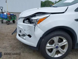 2014 Ford Escape SE with VIN 1FMCU9GX4EUE32062, listed as a IAAI auction lot 42710911 with 68,201 mi miles and . Bid and sale history available at DreamBid. Image 16.