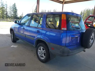 2001 Honda CR-V EX with VIN JHLRD18641C053166, listed as a IAAI auction lot 42078219 with 157,355 mi miles and . Bid and sale history available at DreamBid. Image 3.