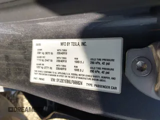 2020 Tesla Model 3 Long Range with VIN 5YJ3E1EB6LF666624, listed as a IAAI auction lot 41720664 with 65,973 mi miles. Bid and sale history available at carsss.com. Image 9.