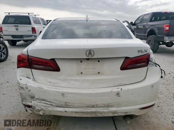 2015 Acura TLX Advance с VIN 19UUB2F77FA021511, выставлен на аукционе Copart как лот 56581325 с пробегом Не указан миль и Списание • Salvage title. История ставок и продаж доступна на DreamBid. Изображение 6.