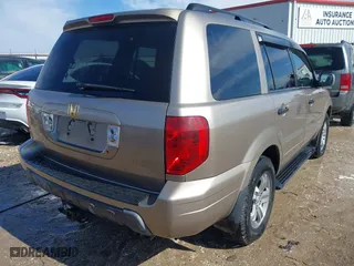 2004 Honda Pilot EX with VIN 2HKYF18574H578967, listed as a IAAI auction lot 41622715 with 150,803 mi miles. Bid and sale history available at carsss.com. Image 4.