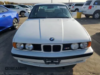 1991 BMW M5 z VIN WBSHD9319MBK05979, wystawiony jako Copart lot #85645534 z przebiegiem 138 219 mil mil oraz Tytuł czysty. Historia ofert i sprzedaży dostępna na DreamBid. Obrazek 5.