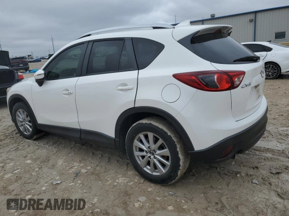 2016 Mazda CX-5 Touring with VIN JM3KE2CY9G0733933, listed as a Copart auction lot 45118885 with 149,901 mi miles and Salvage Title. Bid and sale history available at carsss.com. Image 2.