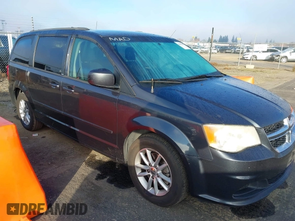 2014 Dodge Grand Caravan SXT with VIN 2C4RDGCG2ER267358, listed as a IAAI auction lot 41001692 with 186,763 mi miles and . Bid and sale history available at DreamBid. Image 1.