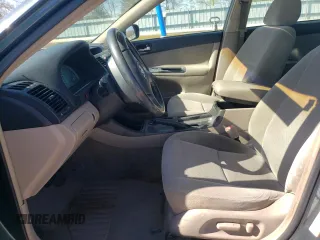 2003 Toyota Camry LE z VIN 4T1BF32K63U559665, wystawiony jako Copart lot #52147645 z przebiegiem 322 212 mil mil oraz Szkoda całkowita • Salvage title. Historia ofert i sprzedaży dostępna na DreamBid. Obrazek 7.