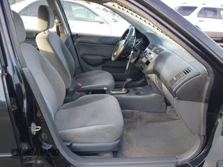 2001 Honda Civic LX with VIN 2HGES16501H619916, listed as a IAAI auction lot 41599951 with 230,395 mi miles. Bid and sale history available at carsss.com. Image 5.