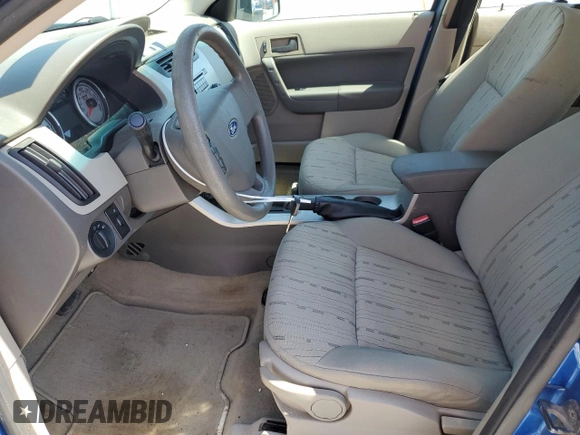 2010 Ford Focus SE with VIN 1FAHP3FN5AW259266, listed as a Copart auction lot 54657775 with 96,916 mi miles and Salvage Title. Bid and sale history available at DreamBid. Image 7.