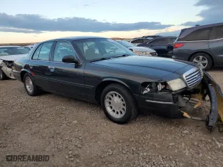 1998 Ford Crown Victoria LX with VIN 2FAFP74W9WX171309, listed as a Copart auction lot 80585734 with 192,162 mi miles and Salvage Title. Bid and sale history available at carsss.com. Image 4.