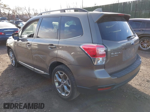 2017 Subaru Forester Touring z VIN JF2SJAWC9HH507636, wystawiony jako IAAI lot #41801988 z przebiegiem 32 030 mil mil oraz . Historia ofert i sprzedaży dostępna na DreamBid. Obrazek 3.