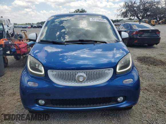 2016 Smart fortwo Passion z VIN WMEFJ5DA5GK058855, wystawiony jako Copart lot #57119445 z przebiegiem 173 493 mil mil oraz Szkody całkowita. Historia ofert i sprzedaży dostępna na DreamBid. Obrazek 5.