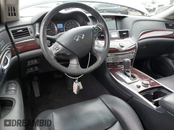 2015 Infiniti Q70 with VIN JN1BY1PR7FM830815, listed as a Copart auction lot 53296645 with 110,872 mi miles and Salvage Title. Bid and sale history available at DreamBid. Image 8.