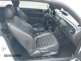 2012 Volkswagen Beetle Turbo with VIN 3VWVA7AT3CM650301, listed as a IAAI auction lot 41525503 with Not Provided miles and . Bid and sale history available at DreamBid. Image 5.